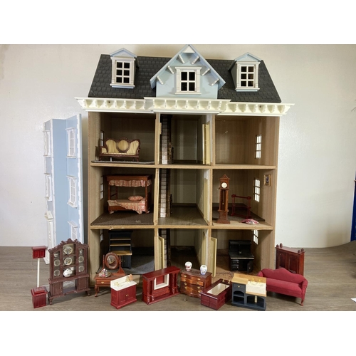 333 - A Georgian style three storey doll’s house with furniture and accessories - approx. 86cm high x 73cm... 