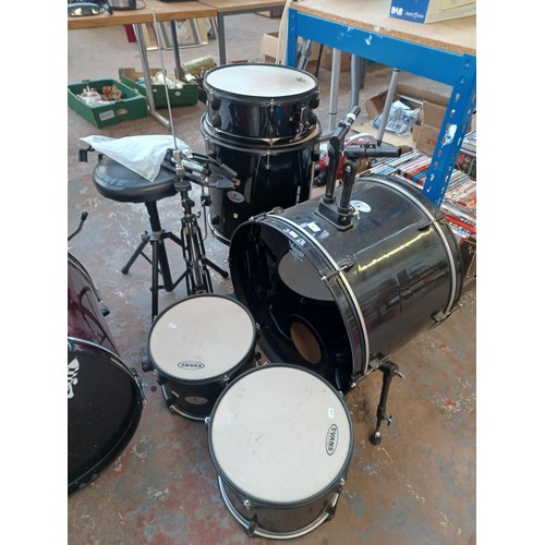 558 - A Stagg five piece drum kit, comprising snare fitted with Remo heads, toms fitted with Evans batters... 