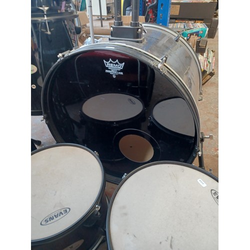 558 - A Stagg five piece drum kit, comprising snare fitted with Remo heads, toms fitted with Evans batters... 