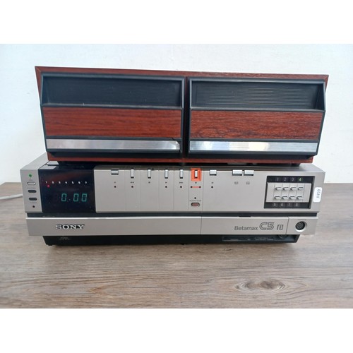 522 - Two items, one Sony SL-C5UB Betamax video recorder and one video cassette storage unit