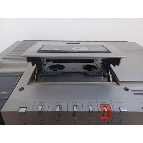 522 - Two items, one Sony SL-C5UB Betamax video recorder and one video cassette storage unit