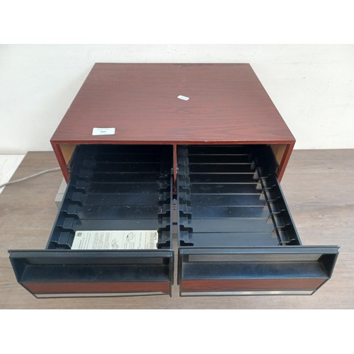 522 - Two items, one Sony SL-C5UB Betamax video recorder and one video cassette storage unit