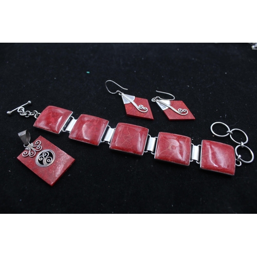 1152C - A .925 silver and coral jewellery set comprising bracelet, earrings and pendant - approx. gross weig... 