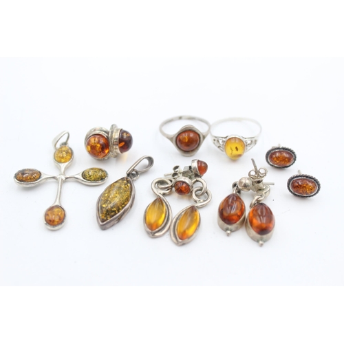 1155C - Eight pieces of .925 silver amber set jewellery - approx. gross weight 23 grams