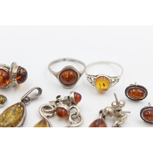 1155C - Eight pieces of .925 silver amber set jewellery - approx. gross weight 23 grams