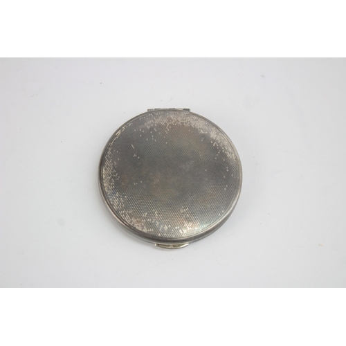 1211 - A Kigu hallmarked London silver vanity compact, dated 1963 - approx. gross weight 71 grams and 7cm d... 