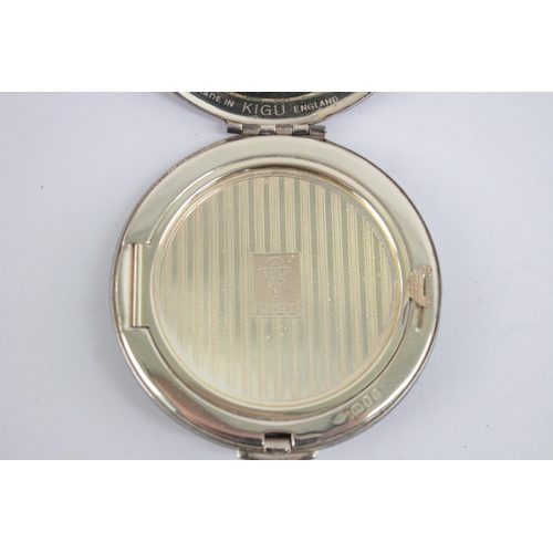 1211 - A Kigu hallmarked London silver vanity compact, dated 1963 - approx. gross weight 71 grams and 7cm d... 