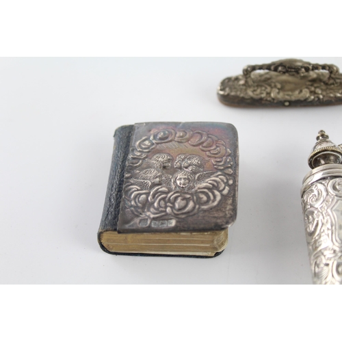 1212 - Six hallmarked sterling silver items to include scent bottles, needle case, silver fronted Bible etc... 