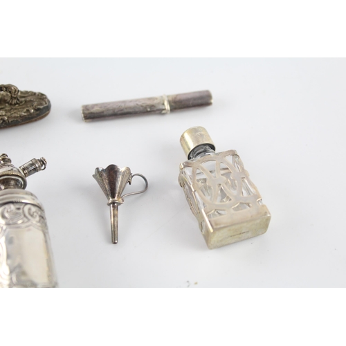 1212 - Six hallmarked sterling silver items to include scent bottles, needle case, silver fronted Bible etc... 