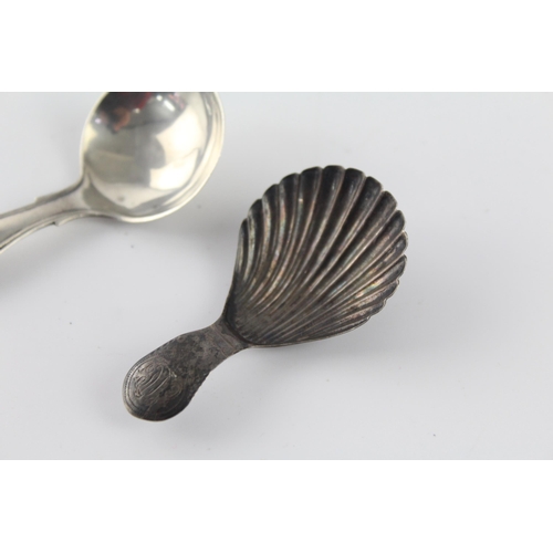 1215 - Two Georgian hallmarked sterling silver caddy spoons - approx. gross weight 18 grams