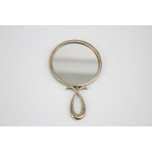 1217 - An Asprey hallmarked Birmingham silver hand mirror, dated 1996 - approx. gross weight 53 grams and 1... 