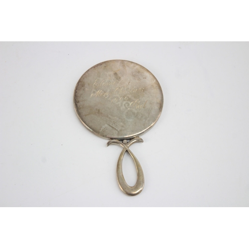 1217 - An Asprey hallmarked Birmingham silver hand mirror, dated 1996 - approx. gross weight 53 grams and 1... 