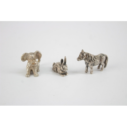 1219 - Three hallmarked sterling silver miniature animals - approx. gross weight 39 grams and 2cm high