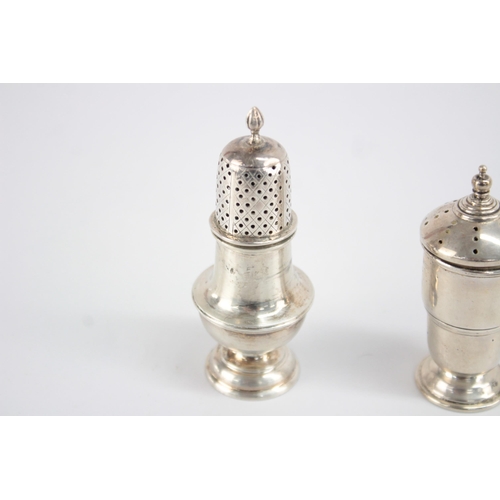 1221 - Two hallmarked sterling silver salt and pepper cellars - approx. gross weight 79 grams