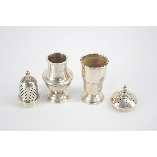 1221 - Two hallmarked sterling silver salt and pepper cellars - approx. gross weight 79 grams