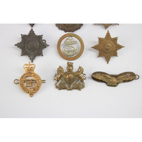 1258 - Twelve military cap badges to include Royal Engineers etc.