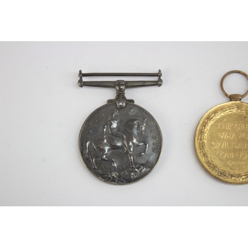 1260 - A WWI medal pair presented to 528236 DVR J. Dear R.E