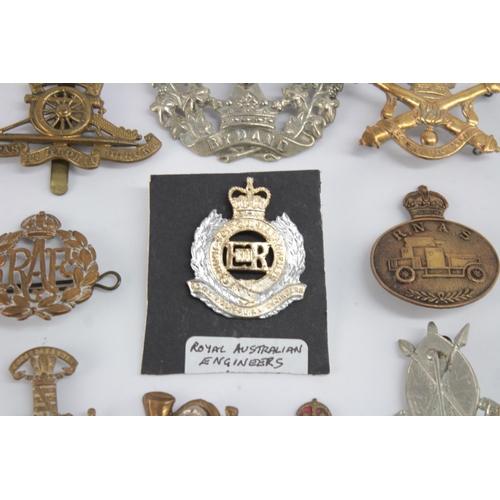 1262 - Ten military cap badges to include Women's Land Army, R.N.A.S etc.