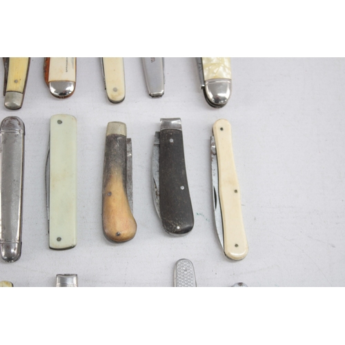 1268 - Twenty antique and vintage pocket knives to include Swayback style etc.