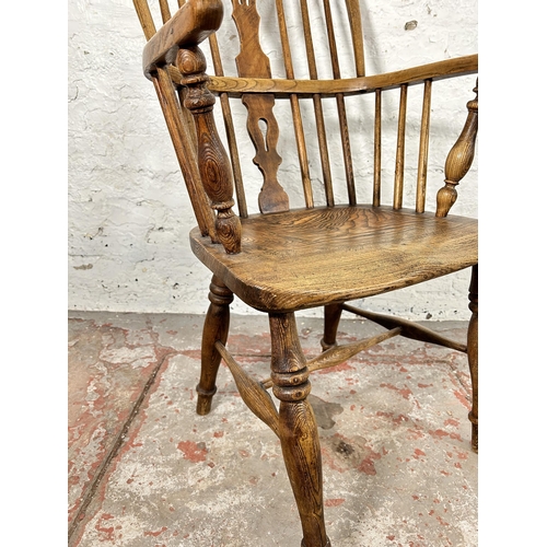 1 - A 19th century elm Windsor armchair - approx. 102cm high x 55cm wide x 41cm deep