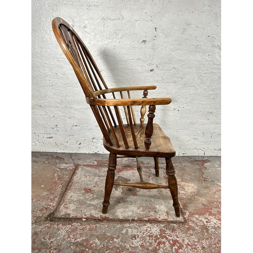 1 - A 19th century elm Windsor armchair - approx. 102cm high x 55cm wide x 41cm deep