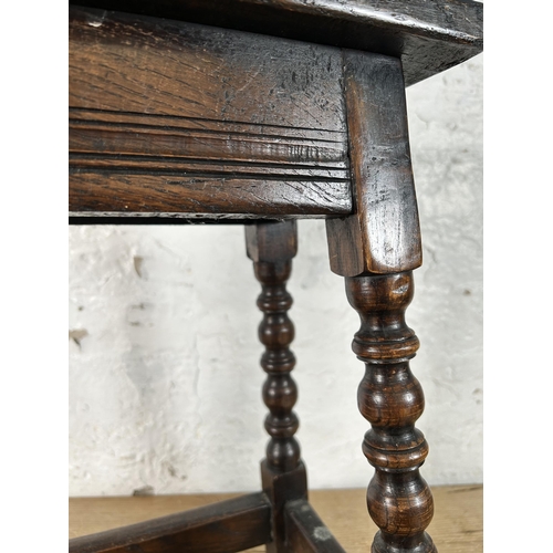 12 - A 17th century style oak joint stool with turned supports - approx. 45cm high x 39cm wide x 23cm dee... 