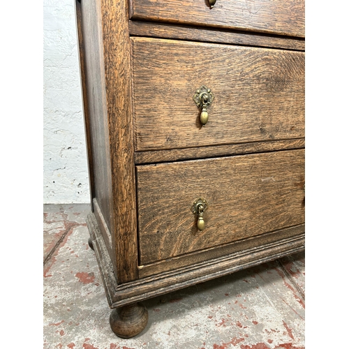 13 - An early 20th century oak chest of three drawers - approx. 82cm high x 75cm wide x 45cm deep