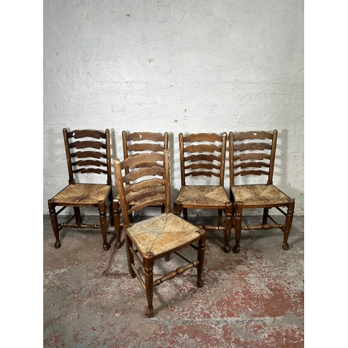 20 - Five 19th century style elm Lancashire dining chairs with rush seats