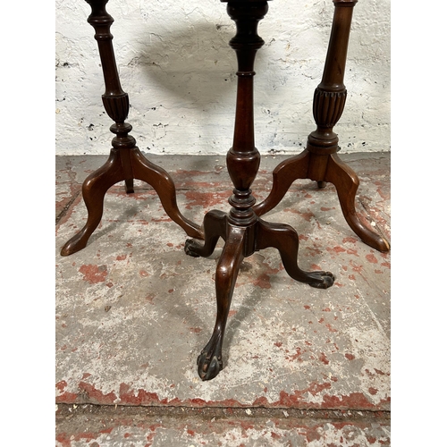 21 - Three mahogany circular tripod pedestal wine tables - largest approx. 54cm high x 31cm diameter