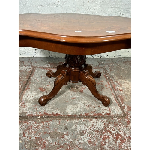 25 - An Italian style inlaid walnut effect serpentine pedestal coffee table - approx. 53cm high x 62cm wi... 