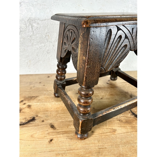 35 - A 17th century style carved oak rectangular joint stool with turned supports - approx. 40cm high x 3... 