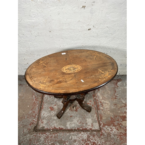 7 - A Victorian inlaid walnut oval occasional table on quatrefoil base - approx. 69cm high x 51cm wide x... 