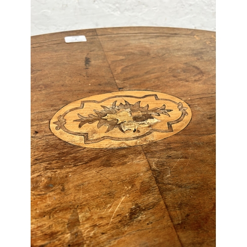 7 - A Victorian inlaid walnut oval occasional table on quatrefoil base - approx. 69cm high x 51cm wide x... 