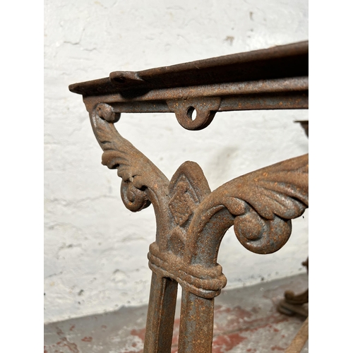 9 - A 19th century Coalbrookdale style cast iron table base - approx. 73cm high x 80cm wide x 37cm deep