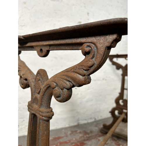 9 - A 19th century Coalbrookdale style cast iron table base - approx. 73cm high x 80cm wide x 37cm deep