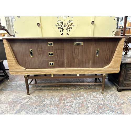 38 - A mid 20th century melamine sideboard with three central drawers and three cupboard doors - approx. ... 