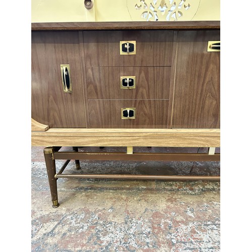 38 - A mid 20th century melamine sideboard with three central drawers and three cupboard doors - approx. ... 