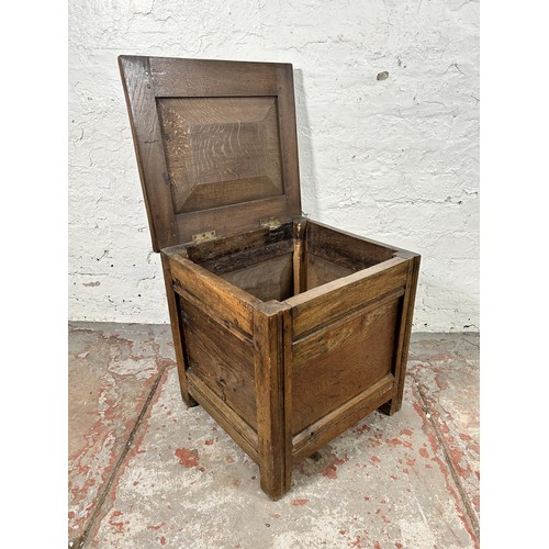 41 - A George III style oak lidded box- approx. 46cm high x 45cm wide x 40cm deep