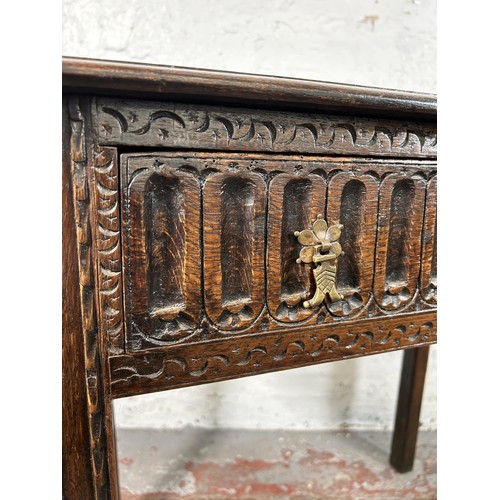 45 - An 18th century carved oak rectangular side table with single drawer - approx. 75cm high x 81cm wide... 