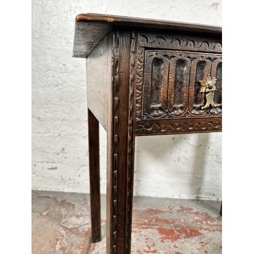 45 - An 18th century carved oak rectangular side table with single drawer - approx. 75cm high x 81cm wide... 