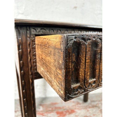 45 - An 18th century carved oak rectangular side table with single drawer - approx. 75cm high x 81cm wide... 