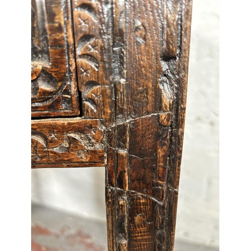 45 - An 18th century carved oak rectangular side table with single drawer - approx. 75cm high x 81cm wide... 