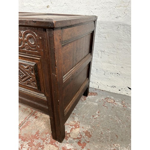 47 - A carved oak blanket box with later added interior and carving - approx. 73cm high x 132cm wide x 58... 