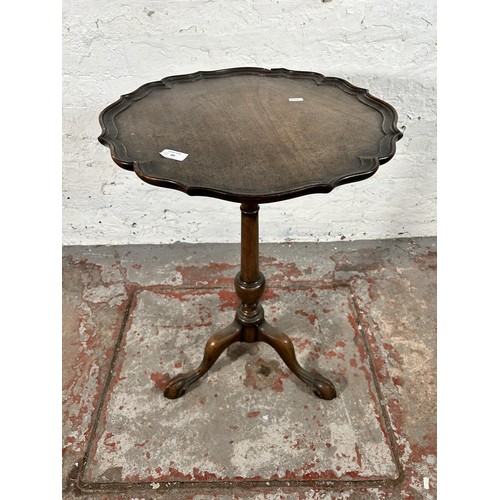 49 - A George III style mahogany serpentine tripod occasional table with ball and claw supports - approx.... 