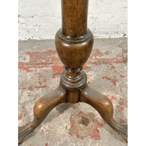 49 - A George III style mahogany serpentine tripod occasional table with ball and claw supports - approx.... 