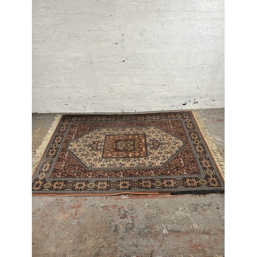 114 - A Persian style rug - approx. 200cm x 140cm