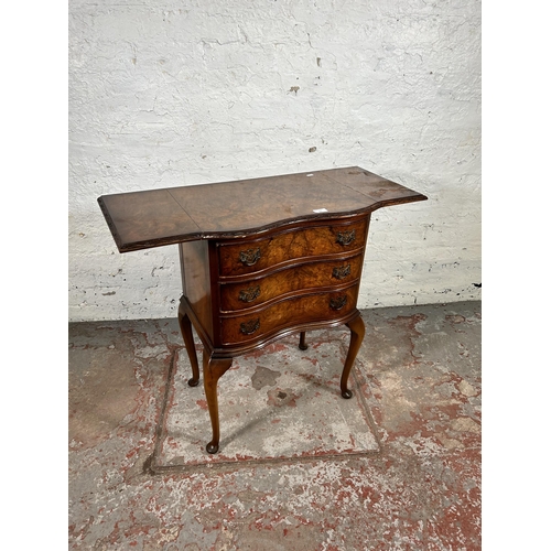 131 - A Queen Anne style walnut chest of three drawers with cabriole supports and two drop leaves - approx... 