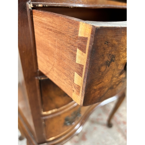 131 - A Queen Anne style walnut chest of three drawers with cabriole supports and two drop leaves - approx... 