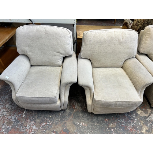 133 - A fabric upholstered three piece lounge suite comprising three seater sofa and two armchairs