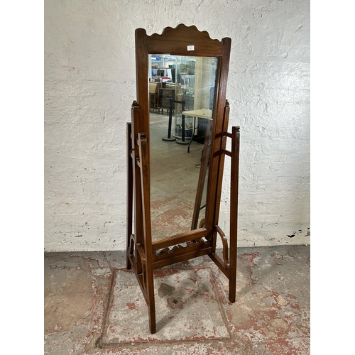 134 - An Arts and Crafts style mahogany cheval mirror - approx. 162cm high x 59cm wide x 60cm deep